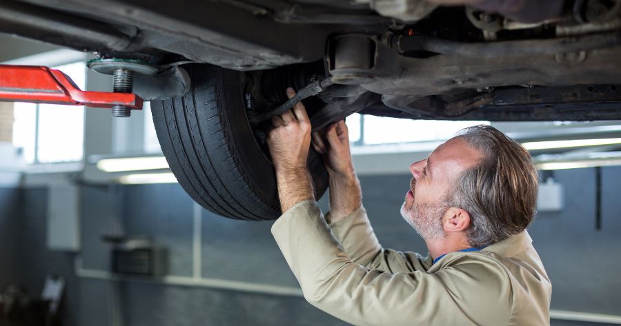 mechanic-servicing-car